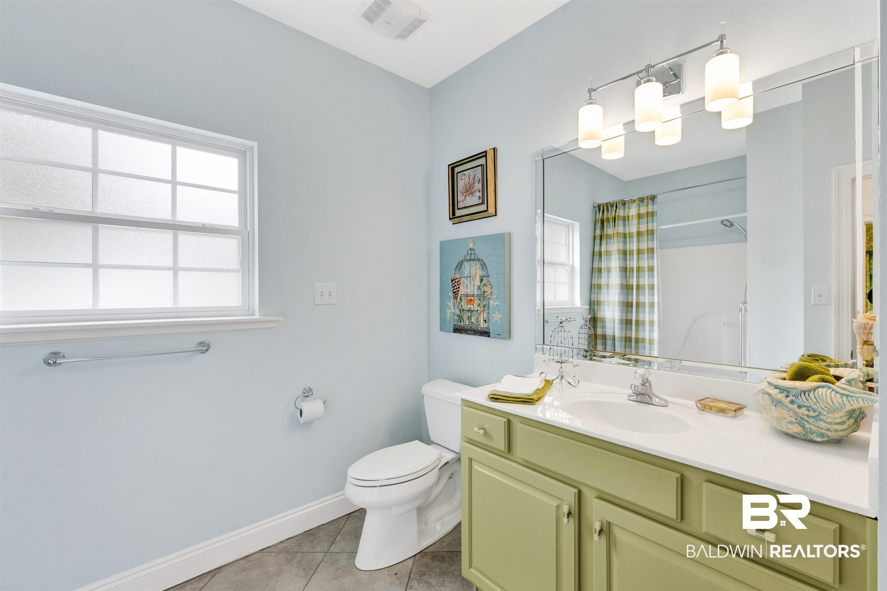 164 Mark Twain Loop Foley, AL 36535 - Photo 22 of 25 Bathroom with vanity, curtained shower, and light tile patterned floors