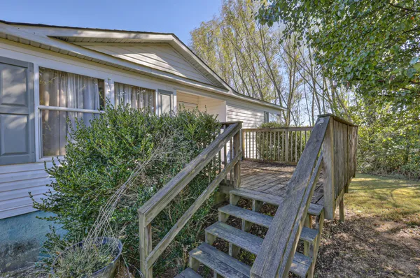 a view of stairs and yard