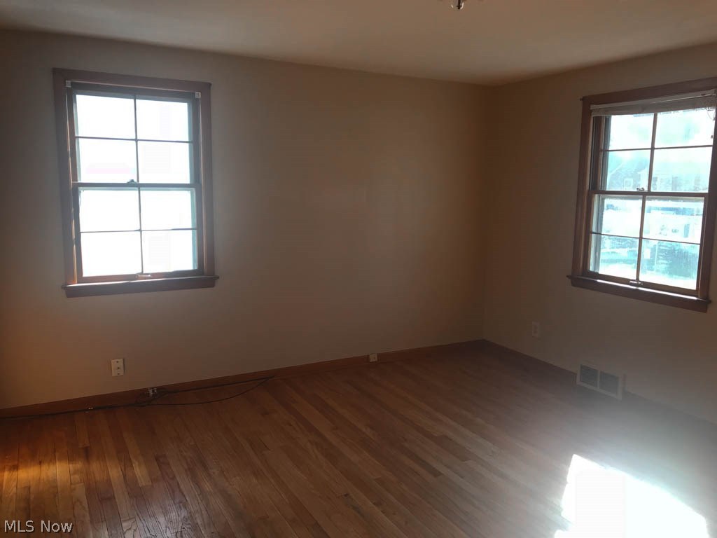 1159 Avondale Road Cleveland, OH 44121 - Photo 8 of 17 Bedroom 1 with wood flooring.