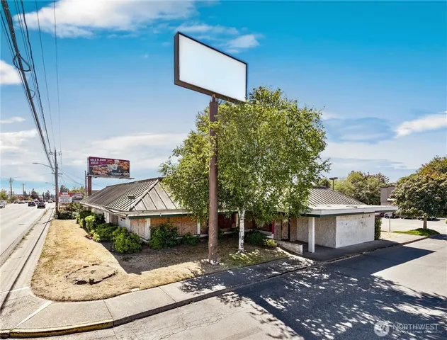 a sign on the side of a road
