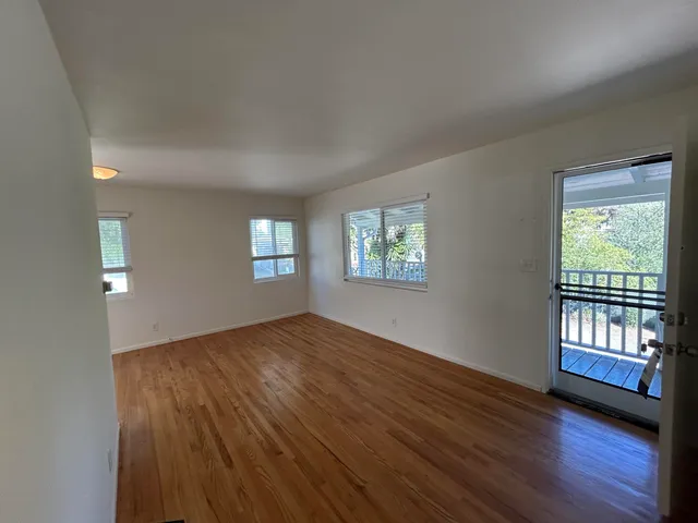 a view of an empty room and window