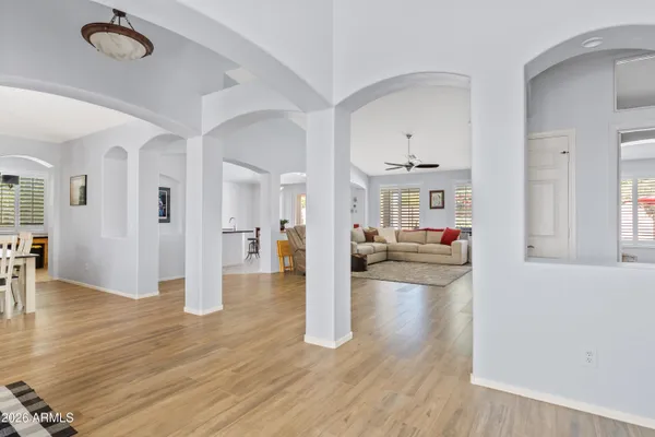 a view of a living room and hardwood floor
