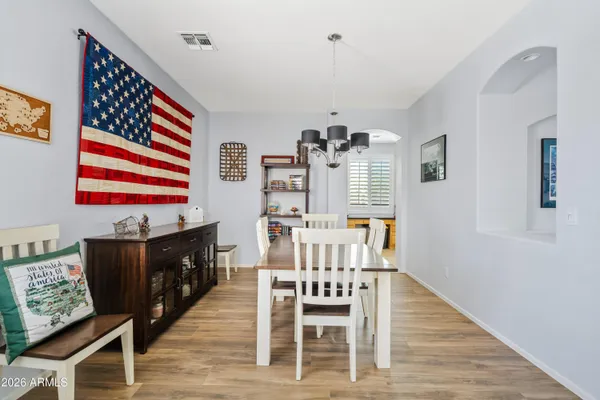 a view of a dining room with furniture