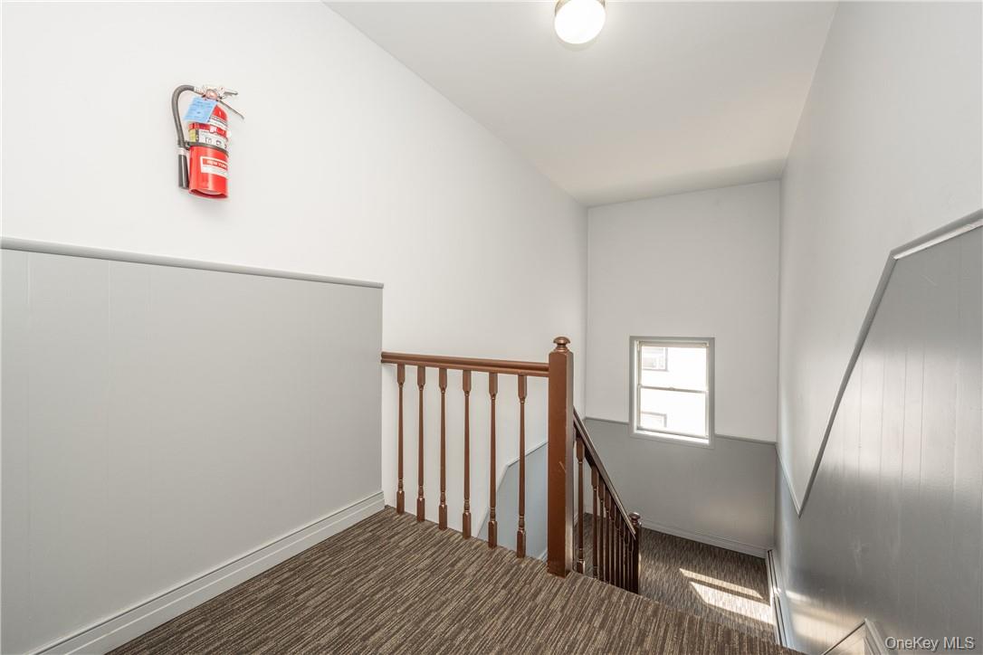 111 Kensington Road, Unit 8 Bronxville, NY 10708 - Photo 9 of 16 an entryway with a workspace