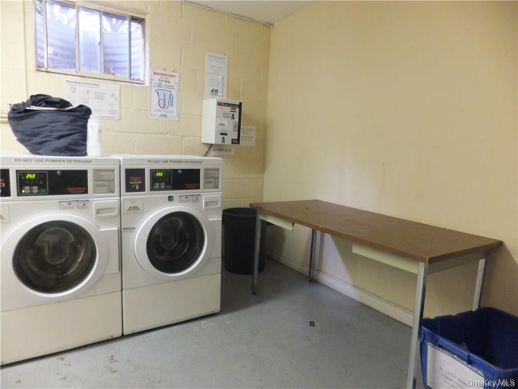 111 Kensington Road, Unit 8 Bronxville, NY 10708 - Photo 10 of 16 a utility room with dryer and washer