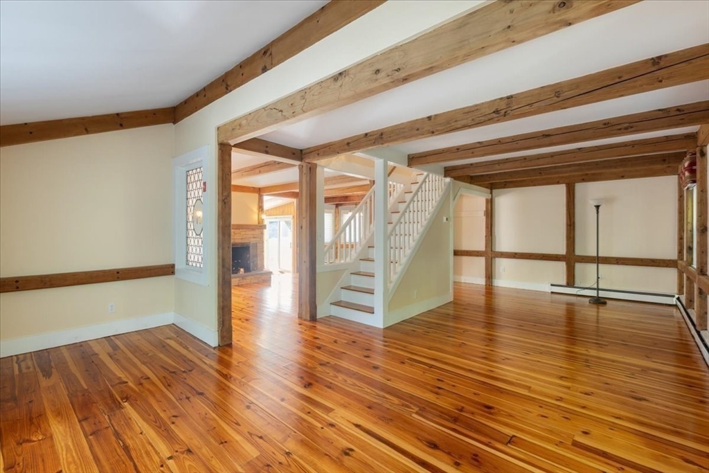 16 Indian Lane Canton, MA 02021 - Photo 17 of 36 a view of an entryway with wooden floor