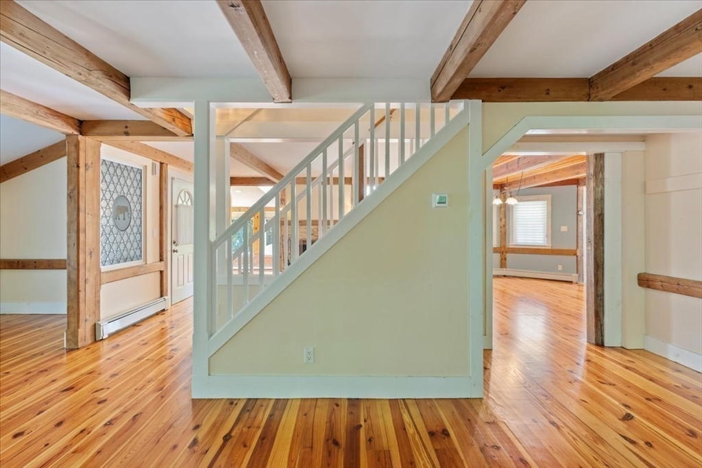 16 Indian Lane Canton, MA 02021 - Photo 18 of 36 a view of entryway with wooden floor