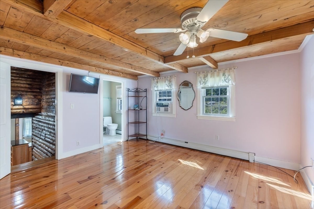 16 Indian Lane Canton, MA 02021 - Photo 31 of 36 a view of empty room with wooden floor