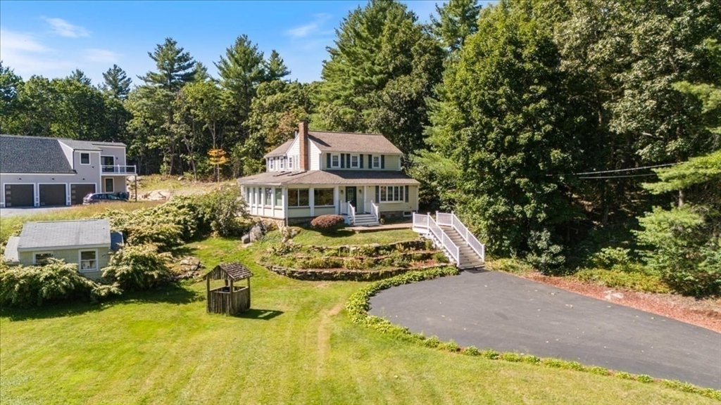 16 Indian Lane Canton, MA 02021 - Photo 34 of 36 a front view of a house with swimming pool