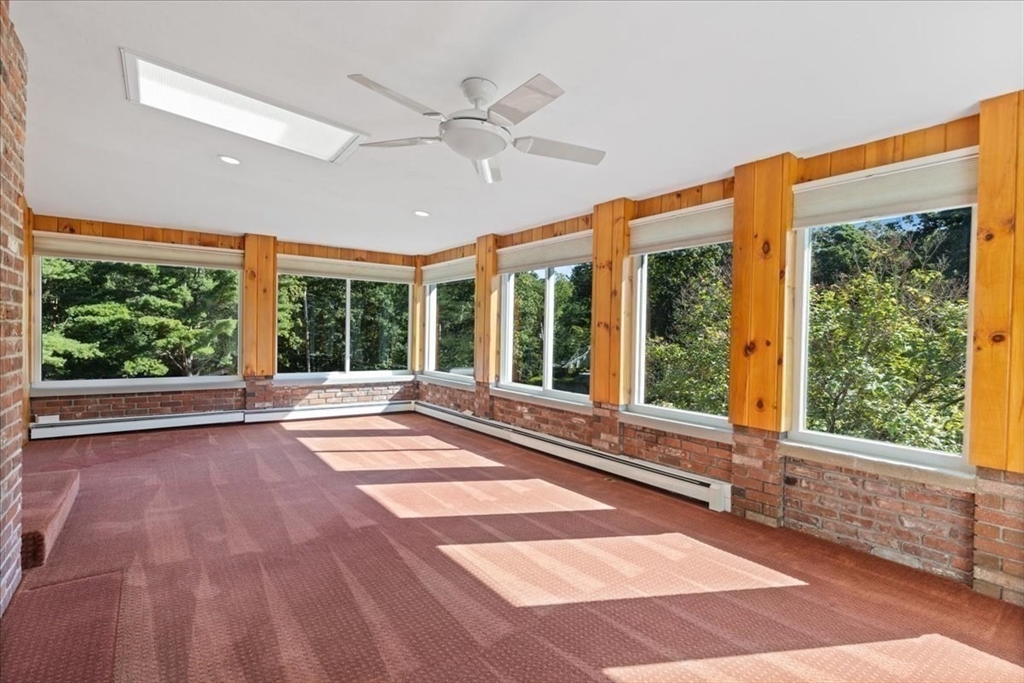 16 Indian Lane Canton, MA 02021 - Photo 9 of 36 a view of an empty room with a large window