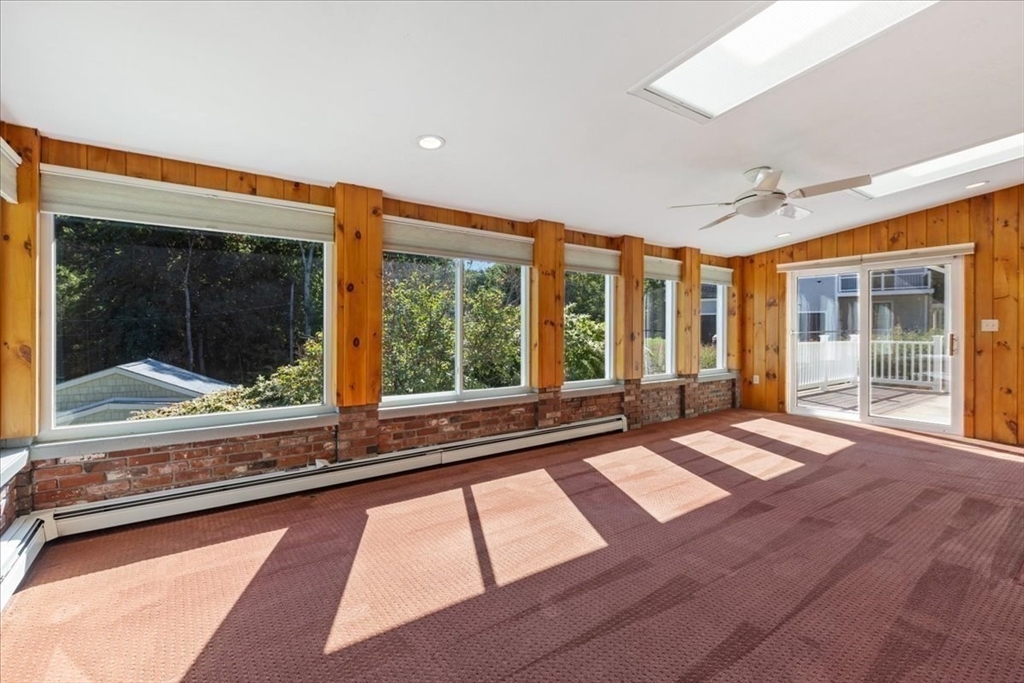 16 Indian Lane Canton, MA 02021 - Photo 10 of 36 a view of swimming pool with a lounge chair in front of house