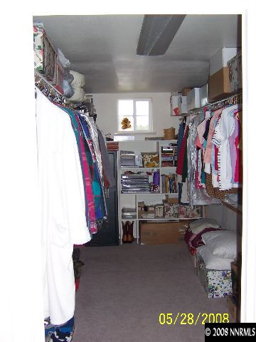 5325 Rivers Edge Drive Fallon, NV 89406 - Photo 8 of 9 a view of walk in closet with clothes and shoes