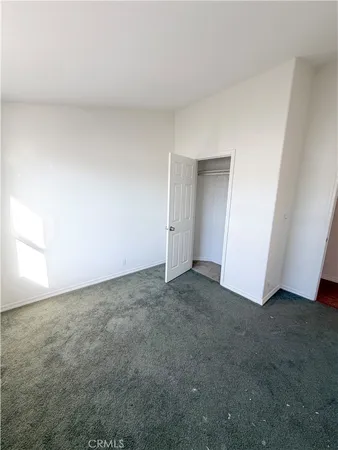 an empty room with an entryway