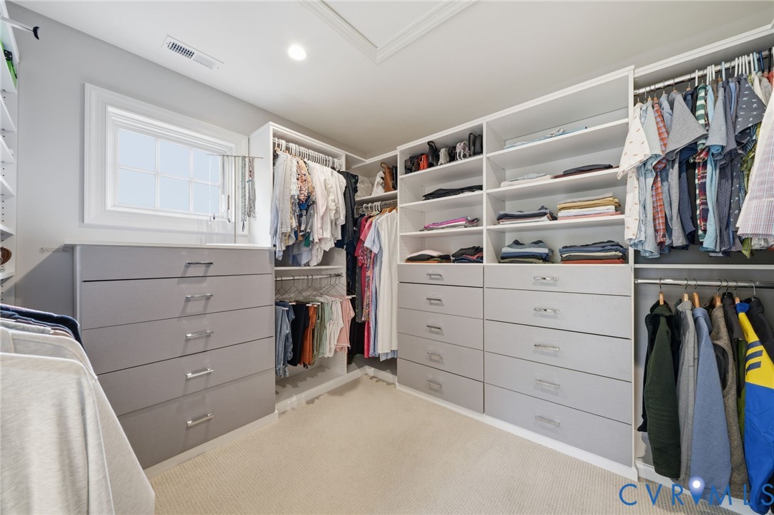 5023 Caledonia Road Richmond, VA 23225 - Photo 26 of 48 An expansive walk-in closet with custom-built cabi