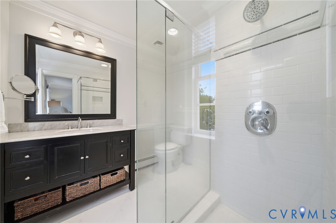 5023 Caledonia Road Richmond, VA 23225 - Photo 28 of 48 Frameless glass shower and polished finishes in th