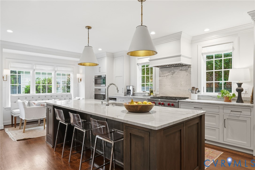 5023 Caledonia Road Richmond, VA 23225 - Photo 4 of 48 Gourmet chef’s kitchen featuring a stately dark wo