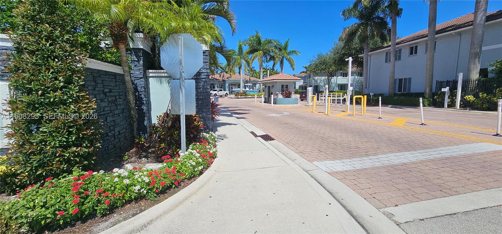 3556 Oleander Terrace, Unit 3556 Riviera Beach, FL 33404 - Photo 25 of 36 a view of a house with palm trees