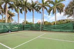 3556 Oleander Terrace, Unit 3556 Riviera Beach, FL 33404 - Photo 32 of 36 a view of a tennis court