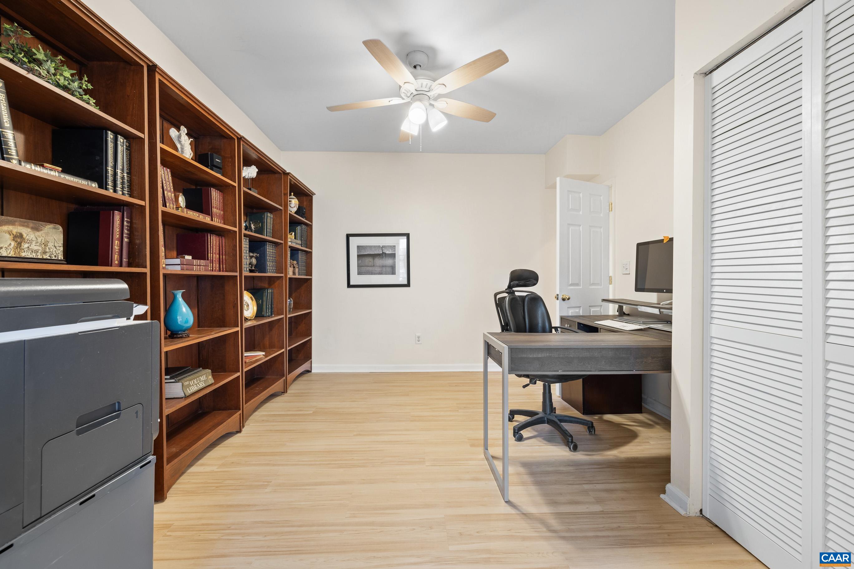 1236 Amber Ridge Road Charlottesville, VA 22901 - Photo 36 of 56 a view of a workspace with furniture and cabinet