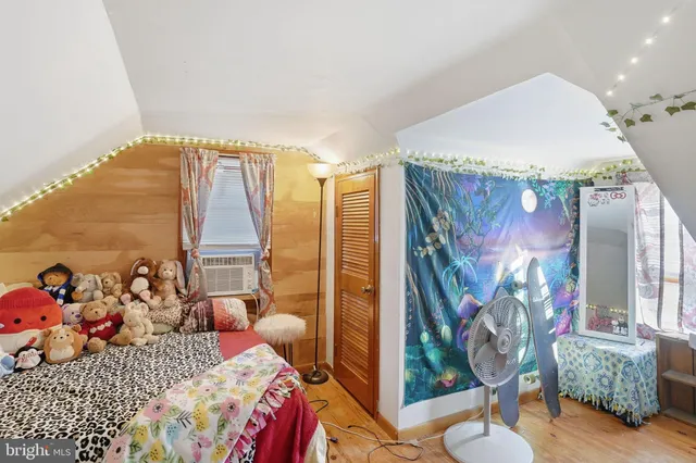 a view of a house with backyard porch and sitting area