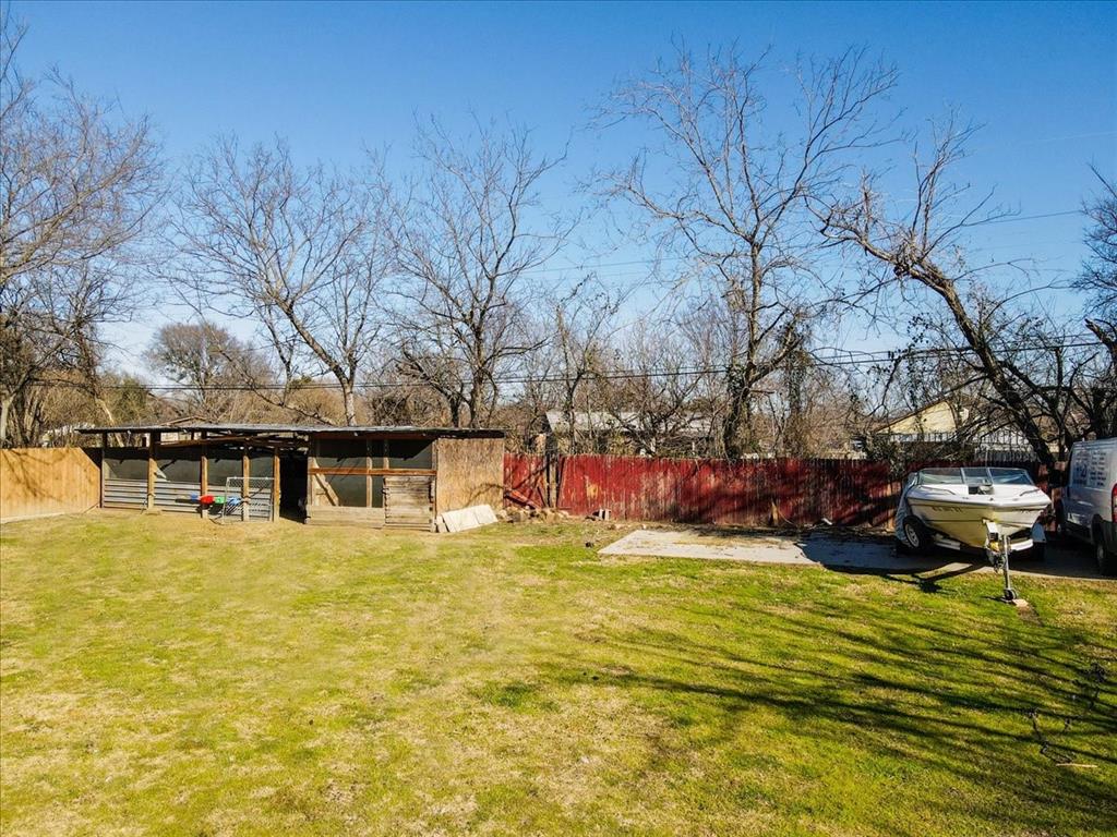 112 North Masters Drive Dallas, TX 75217 - Photo 22 of 22 a view of a swimming pool with an outdoor seating