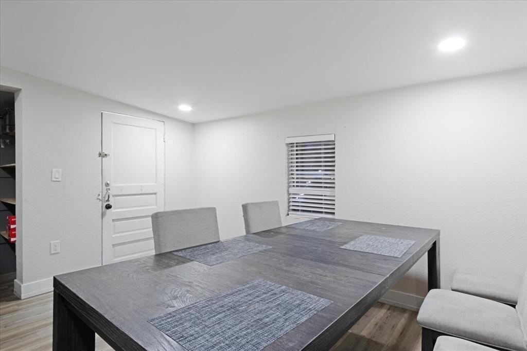 112 North Masters Drive Dallas, TX 75217 - Photo 10 of 22 a view of an empty room and wooden floor