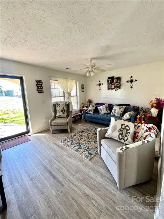 7400 R R H Road Hickory, NC 28602 - Photo 2 of 30 a living room with furniture and a window