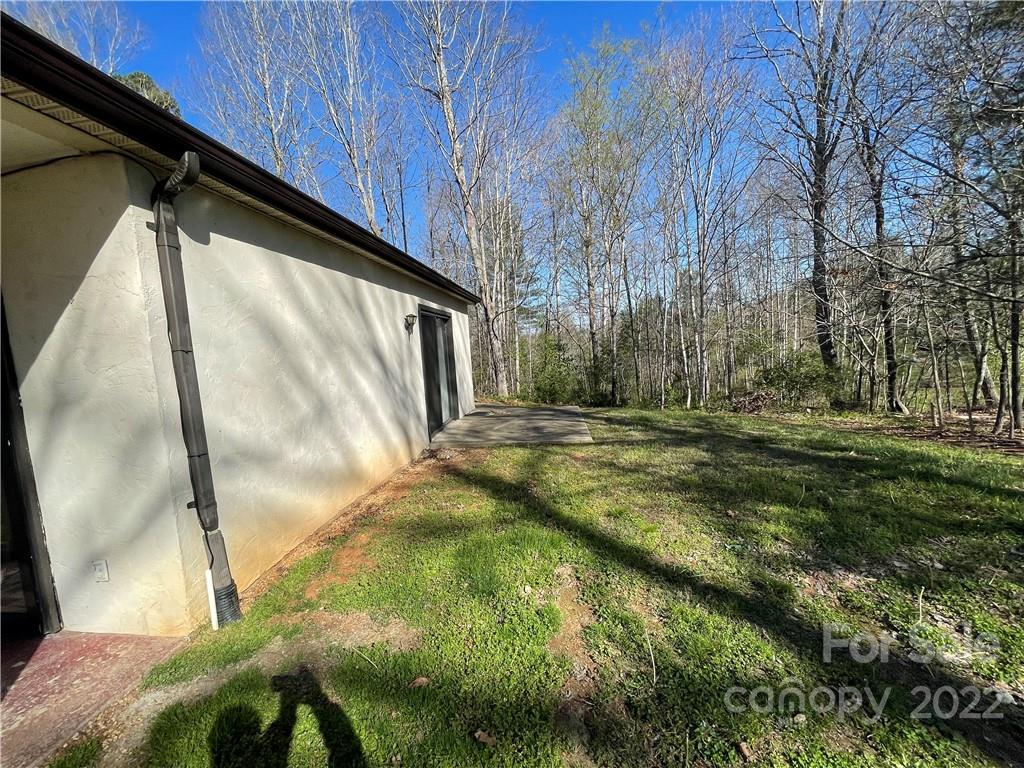 7400 R R H Road Hickory, NC 28602 - Photo 21 of 30 a backyard of a house with lots of green space