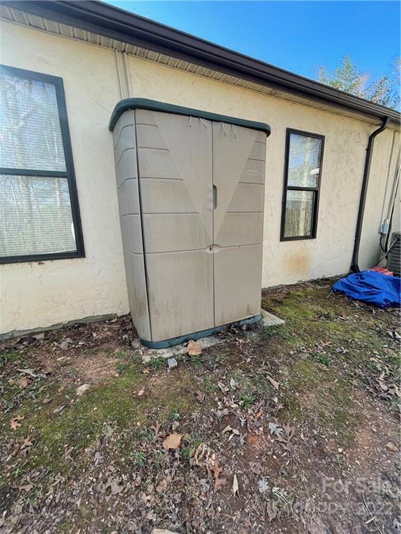 7400 R R H Road Hickory, NC 28602 - Photo 23 of 30 a view of a room with rack on the wall