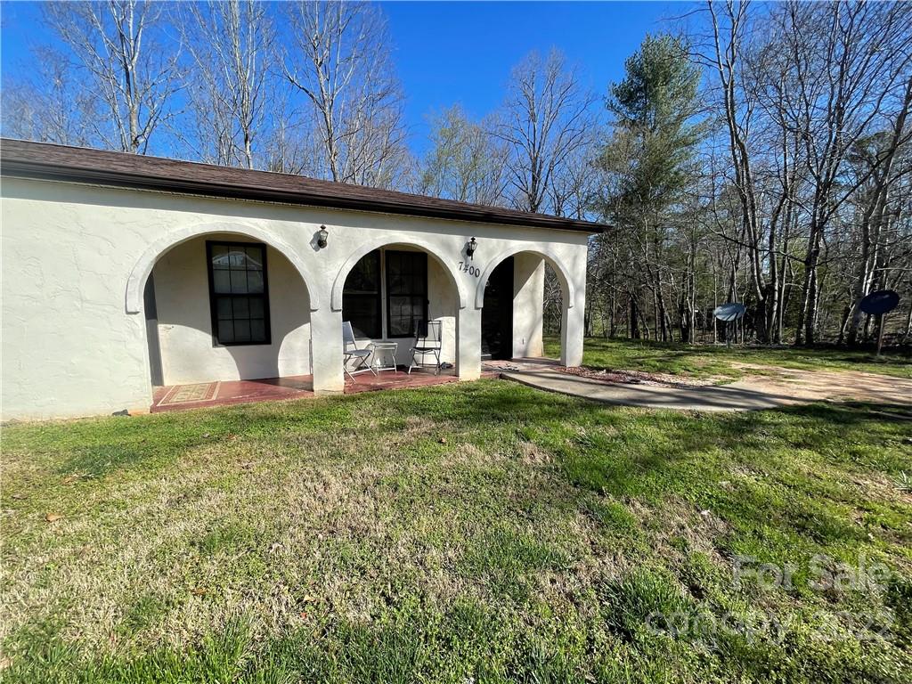 7400 R R H Road Hickory, NC 28602 - Photo 30 of 30 a front view of a house with garden