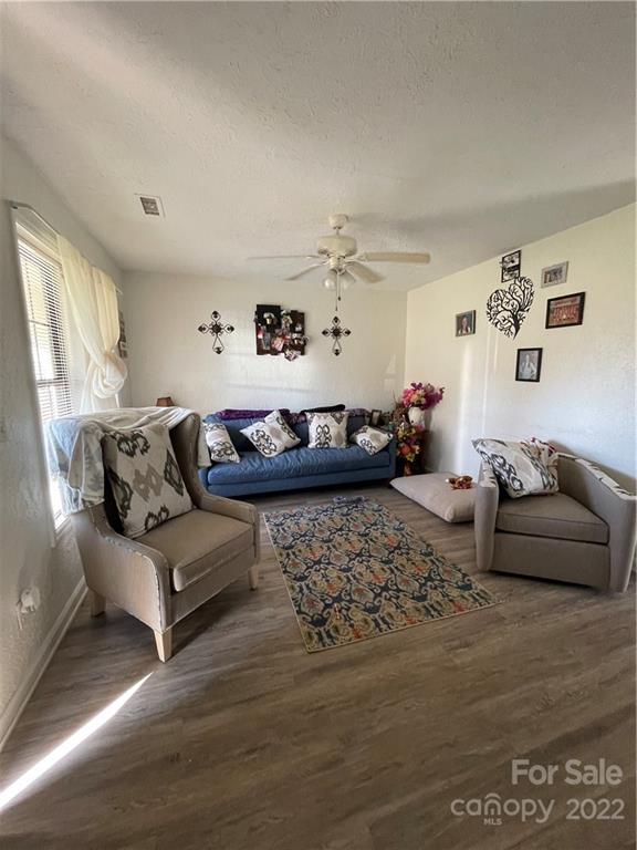 7400 R R H Road Hickory, NC 28602 - Photo 3 of 30 a living room with furniture and a couch