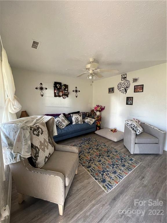 7400 R R H Road Hickory, NC 28602 - Photo 6 of 30 a bedroom with furniture and a rug