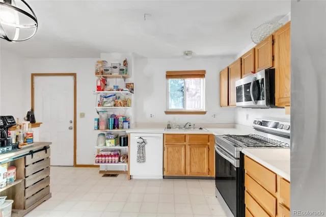 $425,000 | 12136 Newport Drive, Brighton, CO 80602