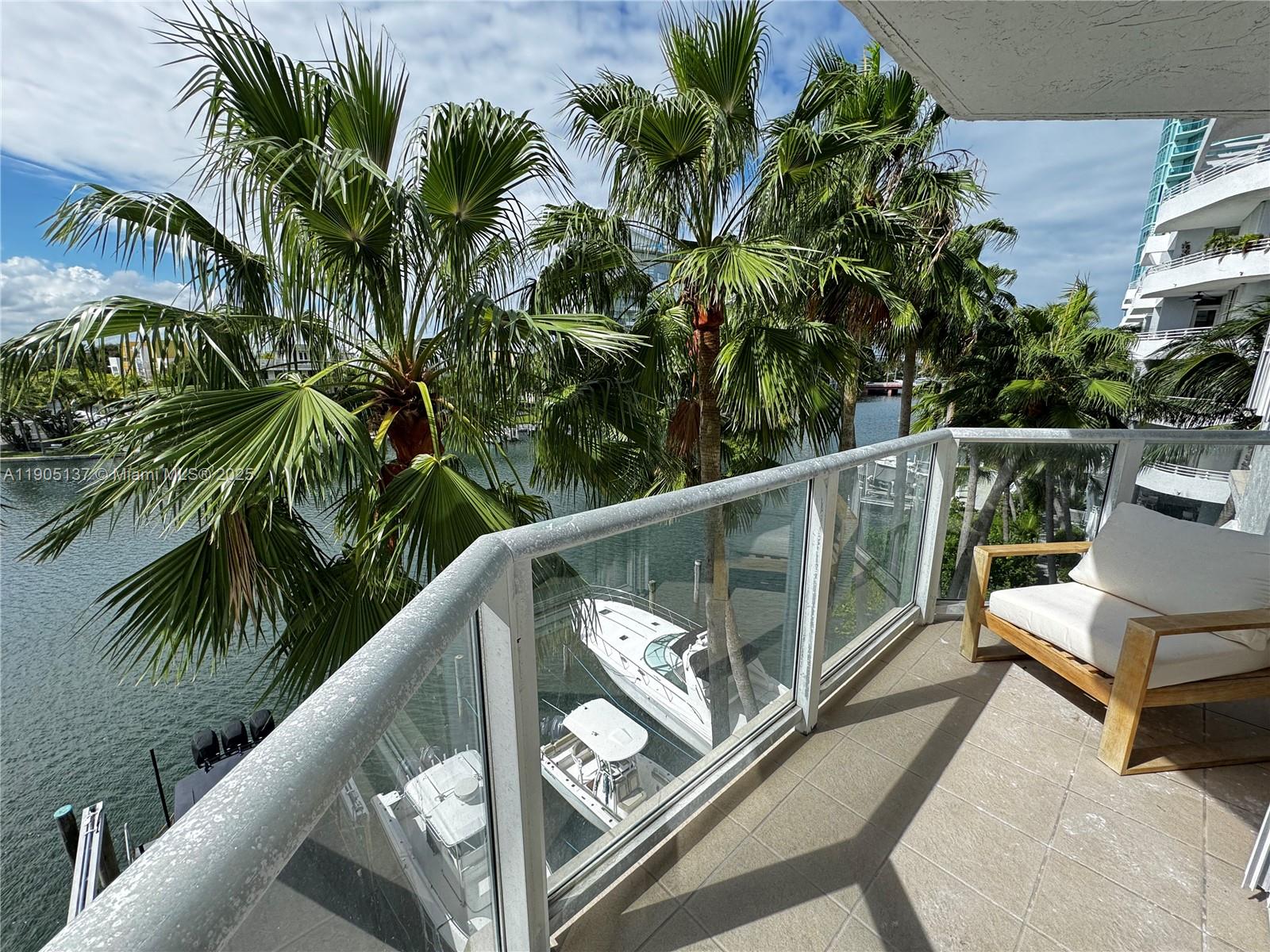 5900 Collins Avenue, Unit 508 Miami Beach, FL 33140 - Photo 14 of 39 a view of balcony with furniture