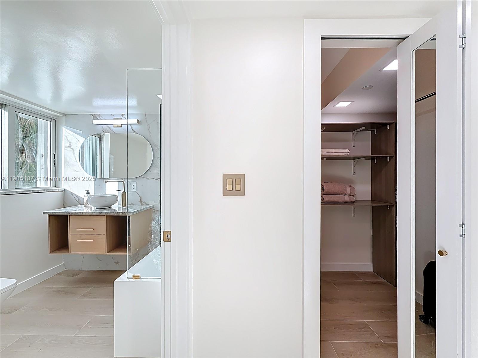 5900 Collins Avenue, Unit 508 Miami Beach, FL 33140 - Photo 23 of 39 a view of a living room with a bathroom