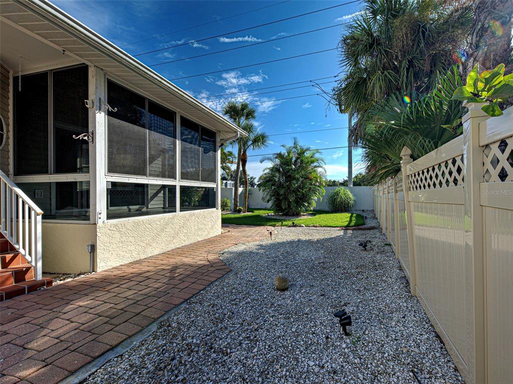 1801 Highland Road Osprey, FL 34229 - Photo 4 of 40 a view of a house with a yard