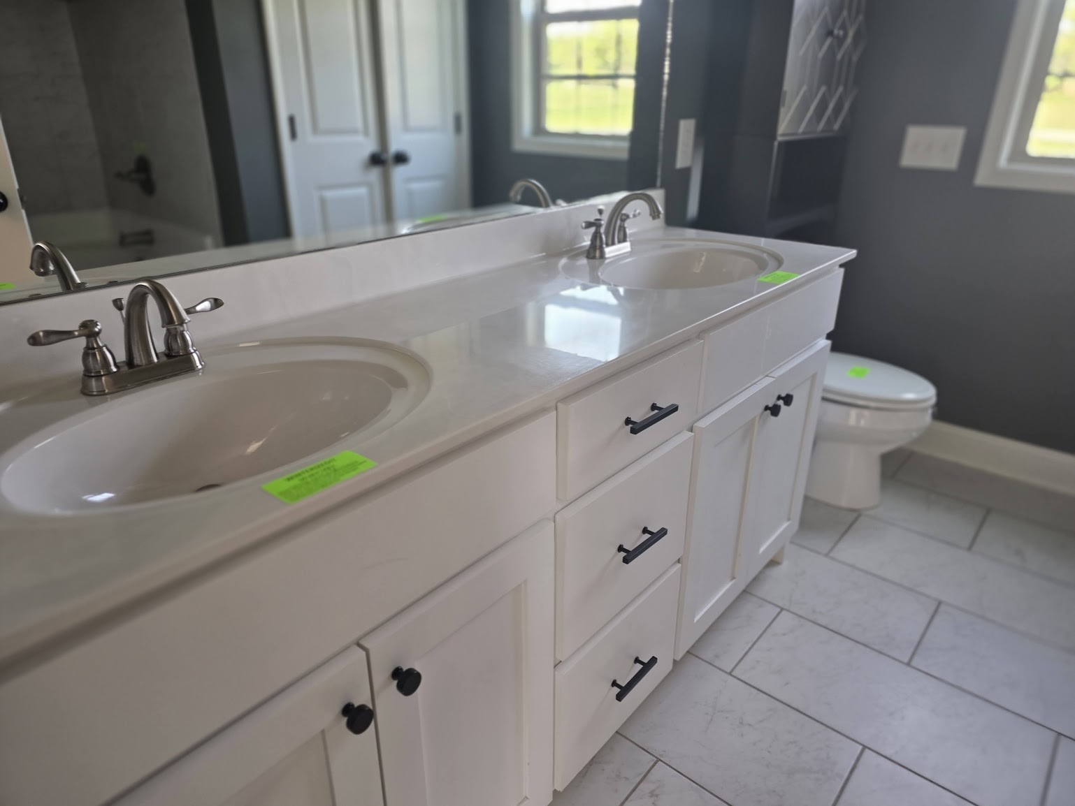 4927 Minnis Road Springfield, TN 37172 - Photo 9 of 15 a bathroom with a granite countertop sink a toilet and mirror