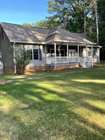 a view of a house with a swimming pool