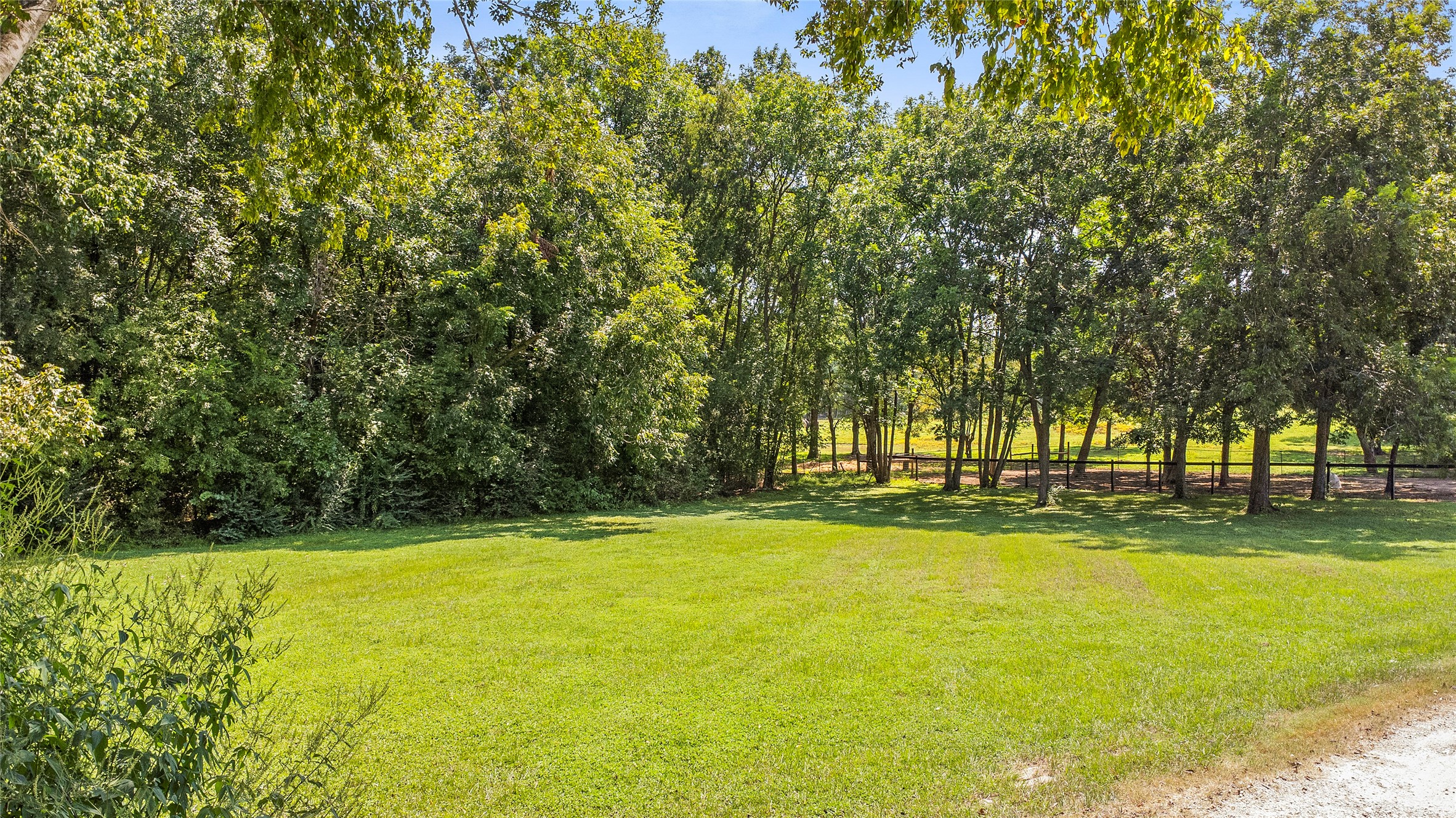0 Fm 1097 Road West Willis, TX 77318 - Photo 4 of 5 a view of swimming pool with an outdoor space and seating area