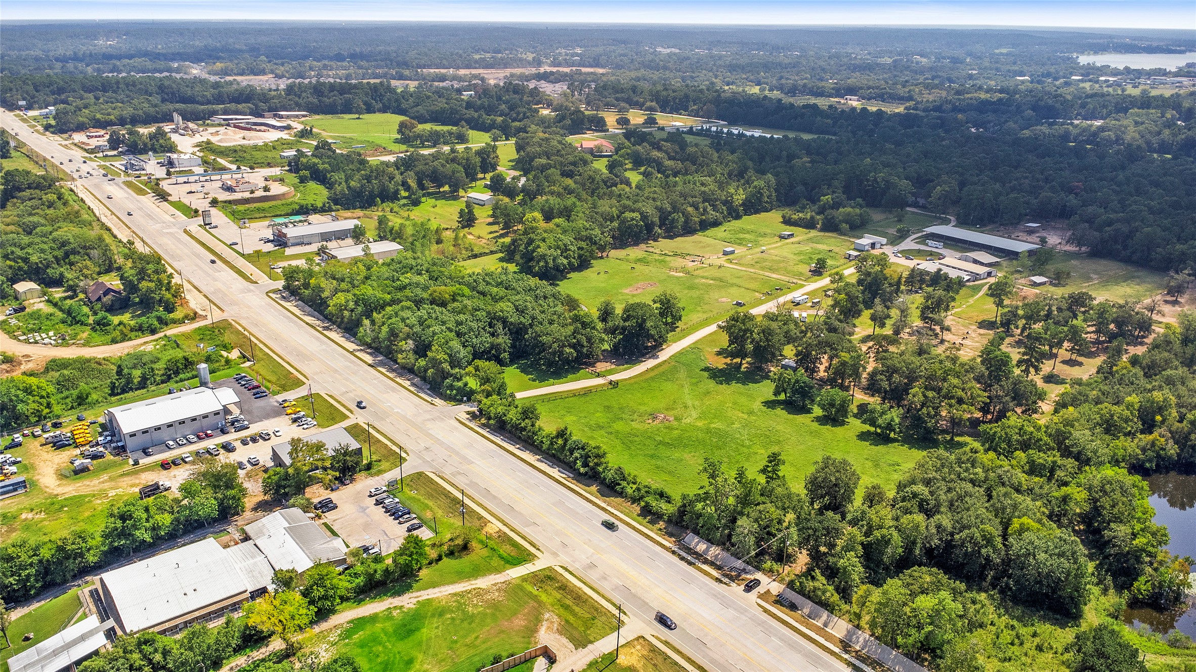 0 Fm 1097 Road West Willis, TX 77318 - Photo 5 of 5 an aerial view of residential houses with outdoor space