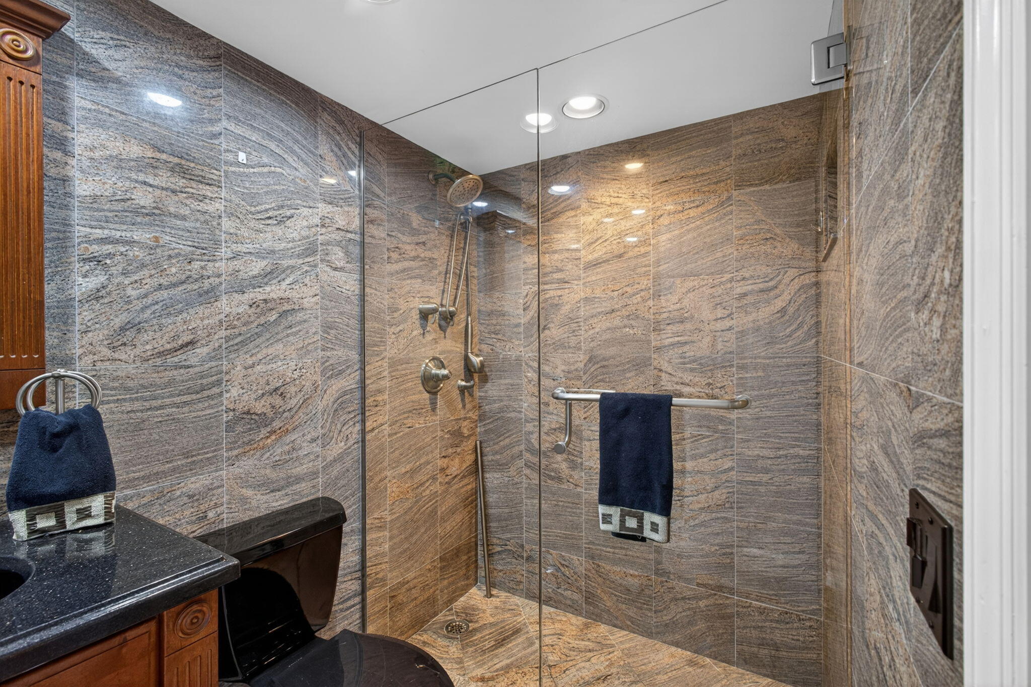 825 Center Street, Unit 50A Jupiter, FL 33458 - Photo 19 of 53 a bathroom with a shower and a sink