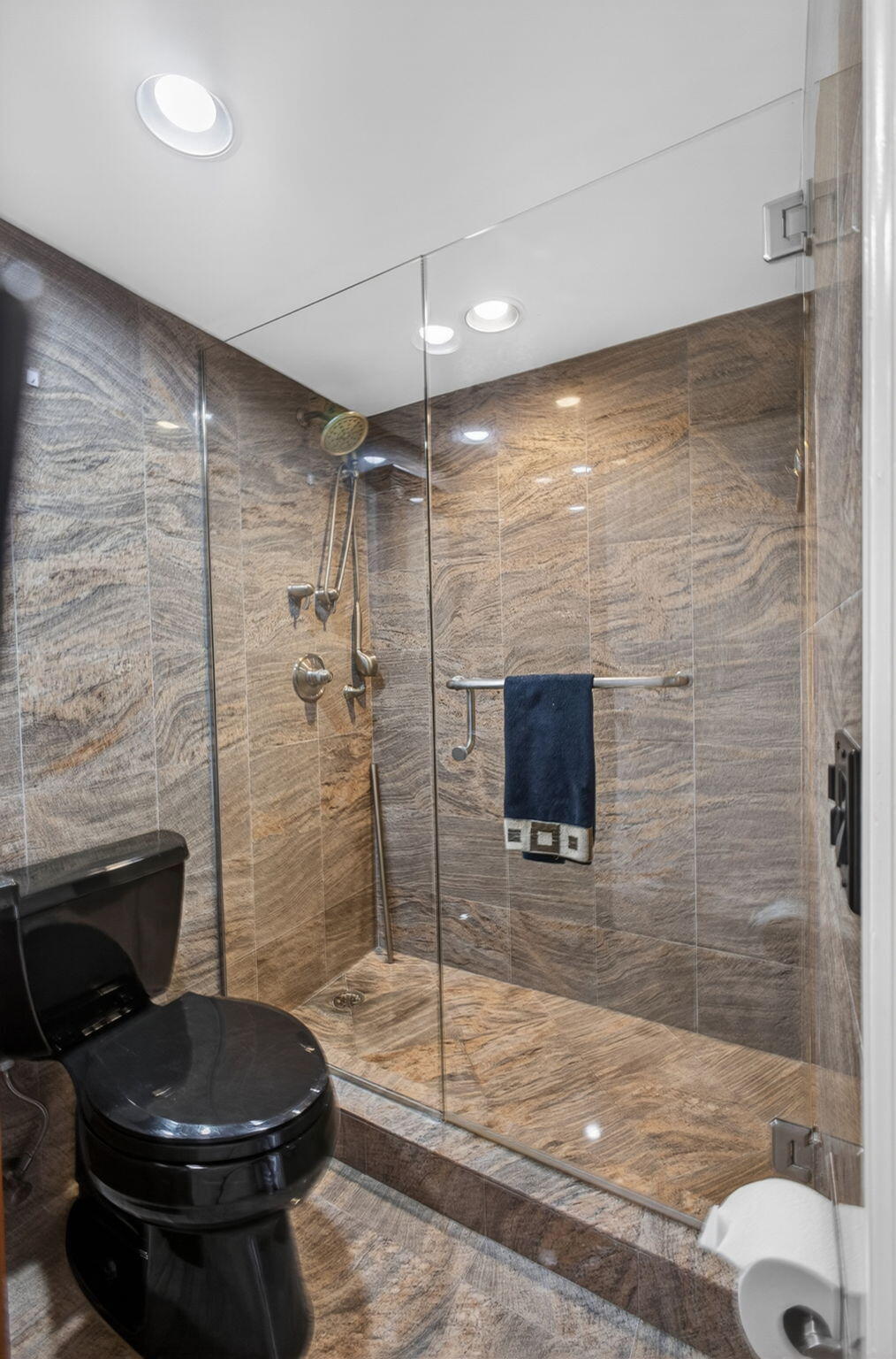 825 Center Street, Unit 50A Jupiter, FL 33458 - Photo 20 of 53 a bathroom with a toilet and a shower