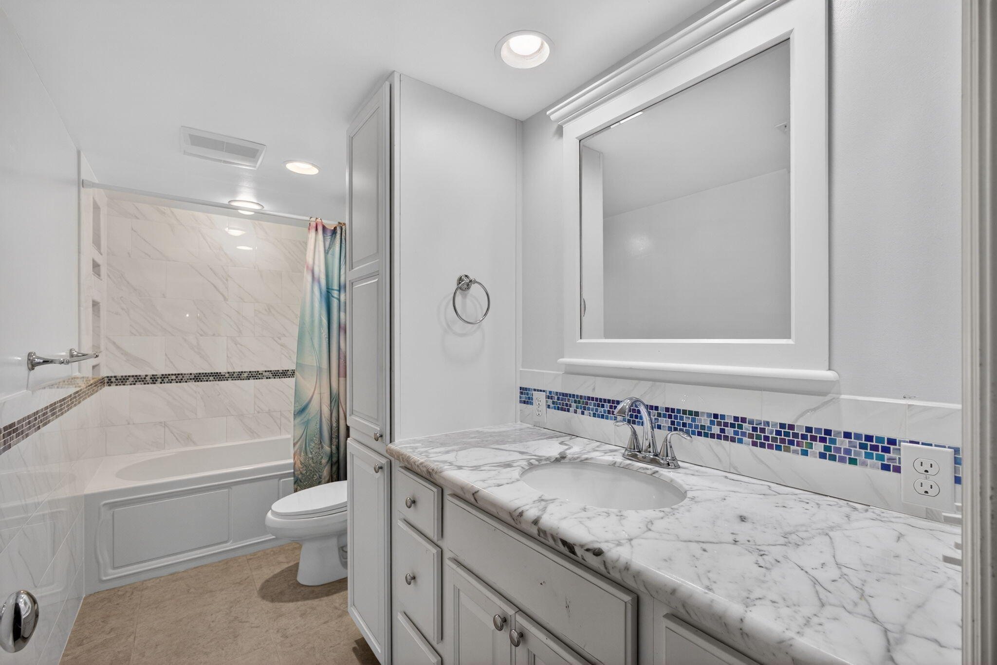 825 Center Street, Unit 50A Jupiter, FL 33458 - Photo 23 of 53 a bathroom with a granite countertop sink toilet and shower
