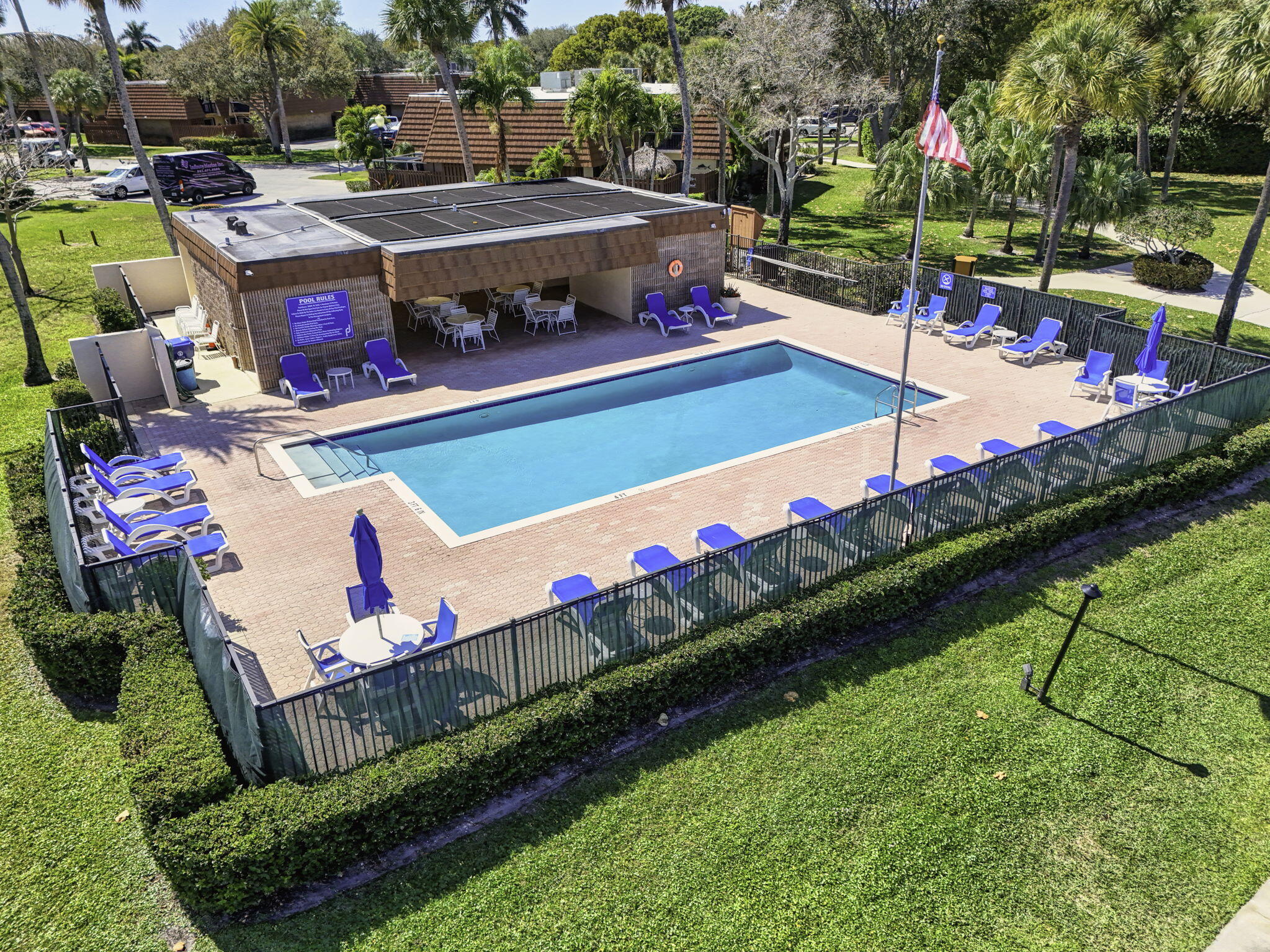 825 Center Street, Unit 50A Jupiter, FL 33458 - Photo 31 of 53 a view of swimming pool with outdoor seating