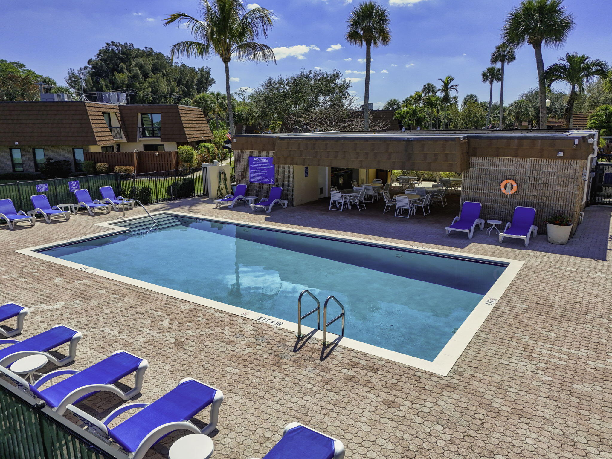 825 Center Street, Unit 50A Jupiter, FL 33458 - Photo 34 of 53 a view of swimming pool with seating space