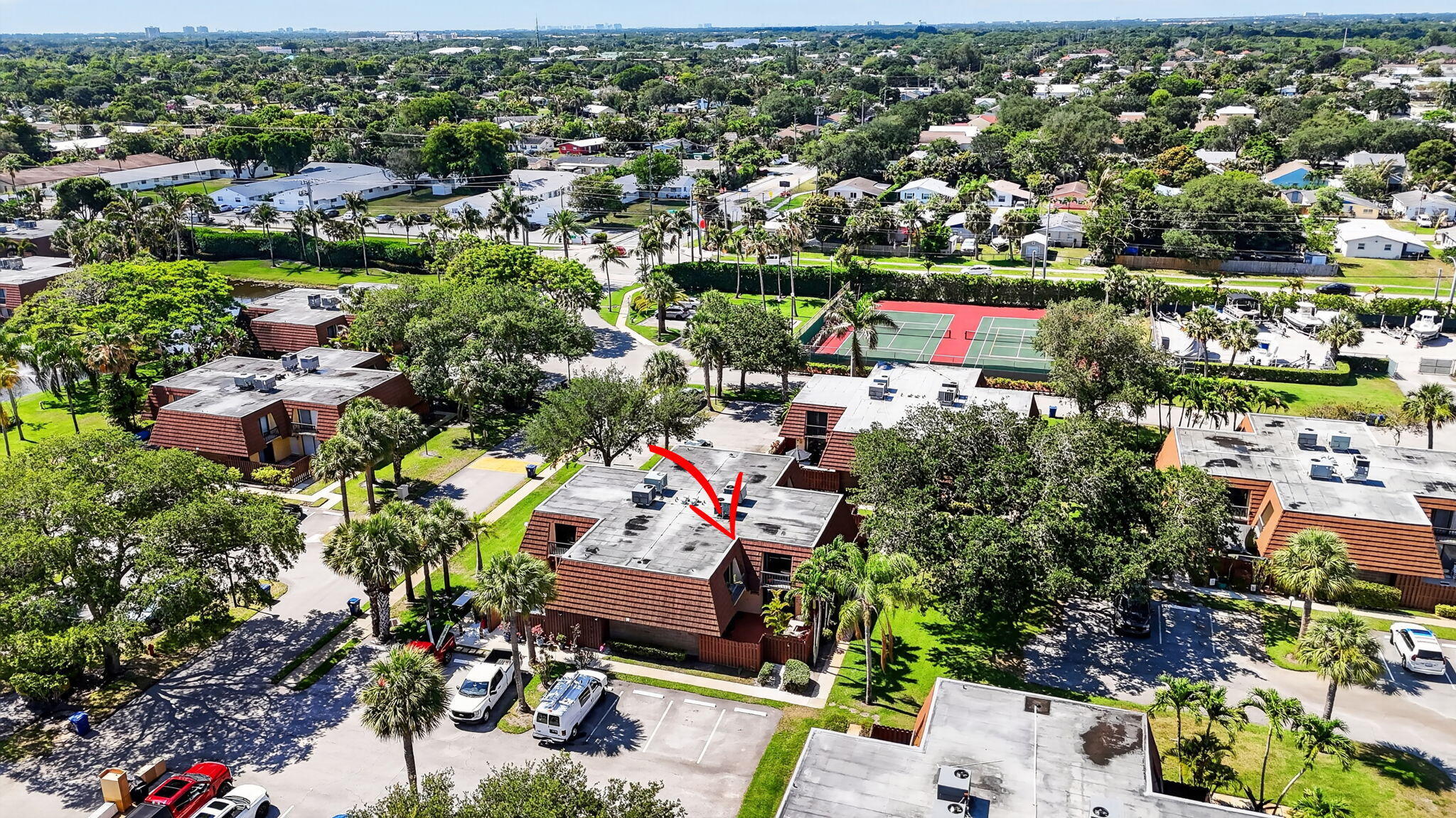 825 Center Street, Unit 50A Jupiter, FL 33458 - Photo 41 of 53 an aerial view of residential houses with outdoor space and street view