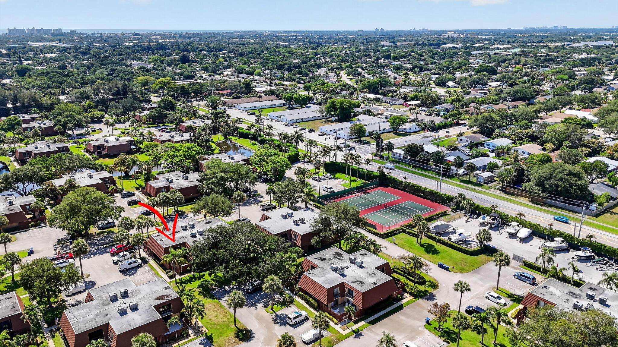 825 Center Street, Unit 50A Jupiter, FL 33458 - Photo 42 of 53 an aerial view of residential house with outdoor space and lake view