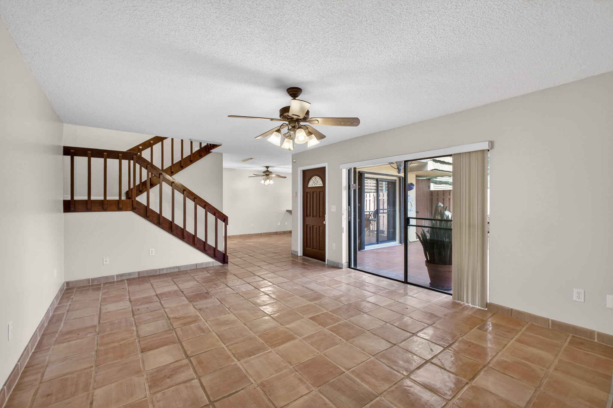 825 Center Street, Unit 50A Jupiter, FL 33458 - Photo 8 of 53 a view of a hallway with a chandelier