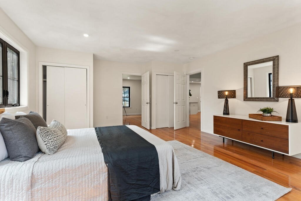 58 Maple Road Melrose, MA 02176 - Photo 15 of 34 a bedroom with a bed and a dresser