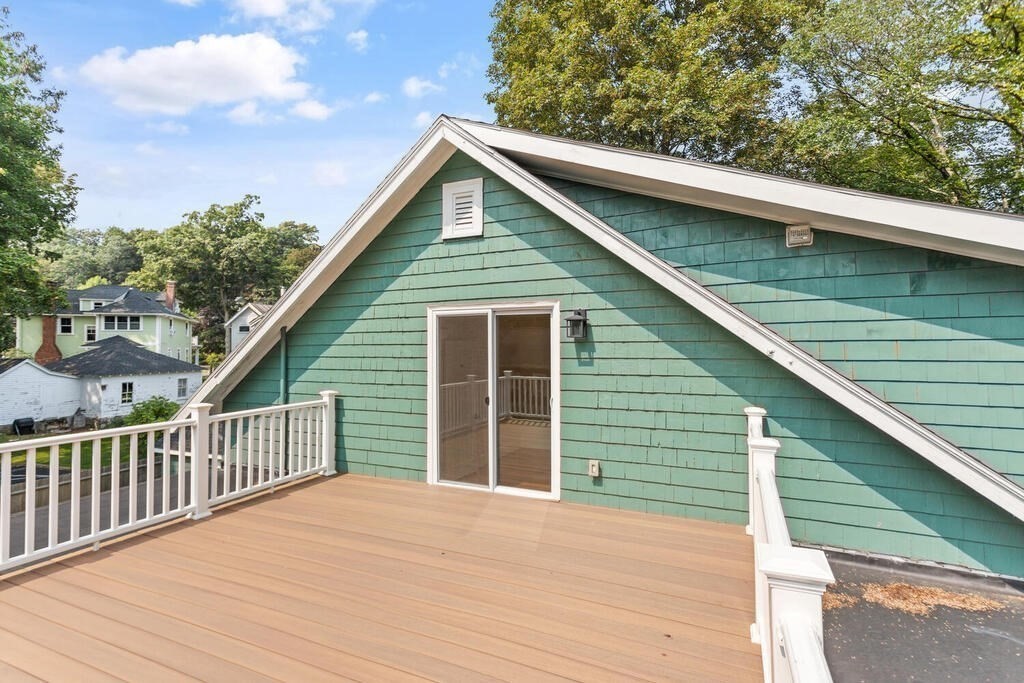 58 Maple Road Melrose, MA 02176 - Photo 29 of 34 a view of a house with a balcony